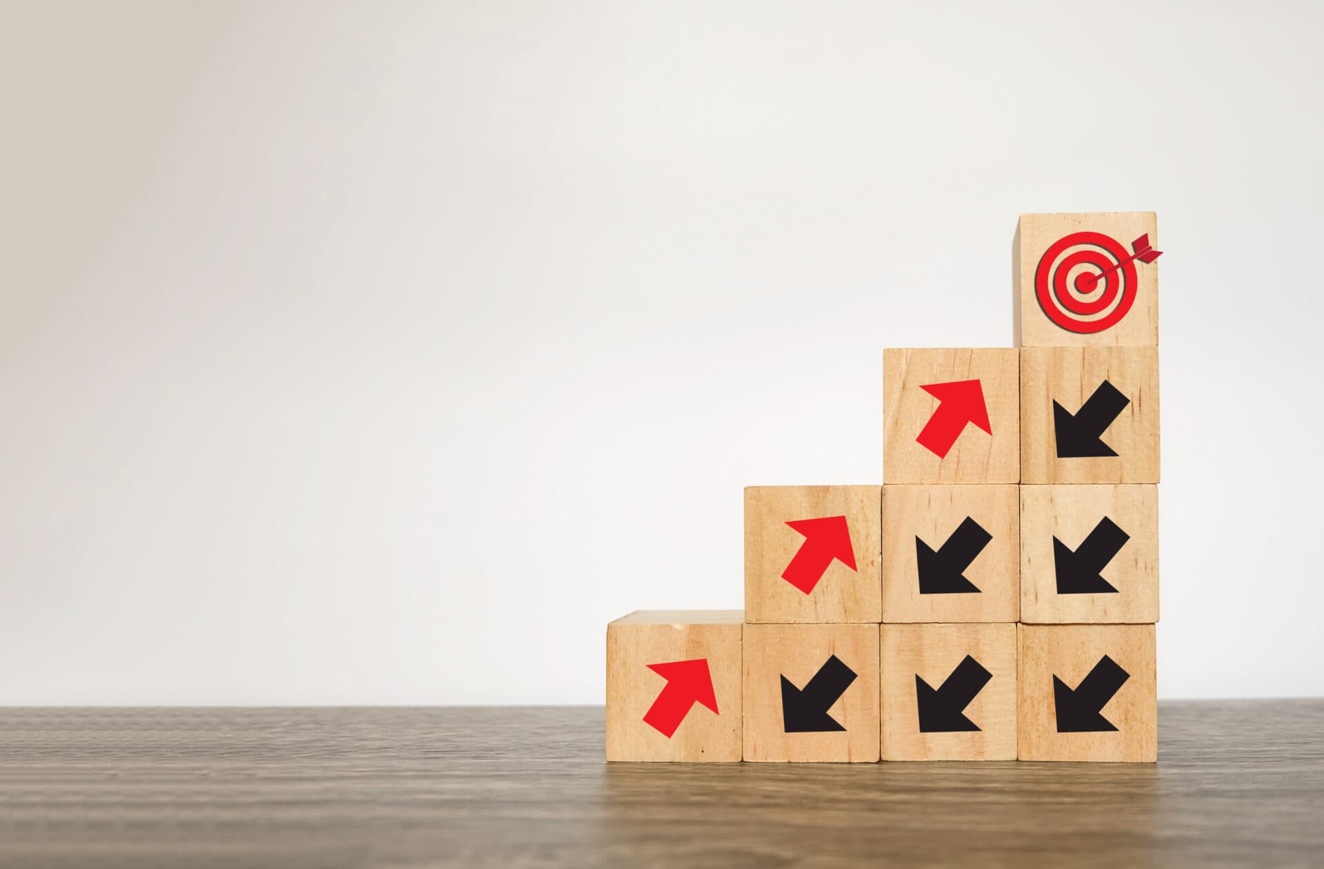 Woodblock Cubes With Arrow. Red Arrow Facing The Opposite Direction From Black Arrows And Head Towards The Target. Disrupt, Difference Thinking Concept.