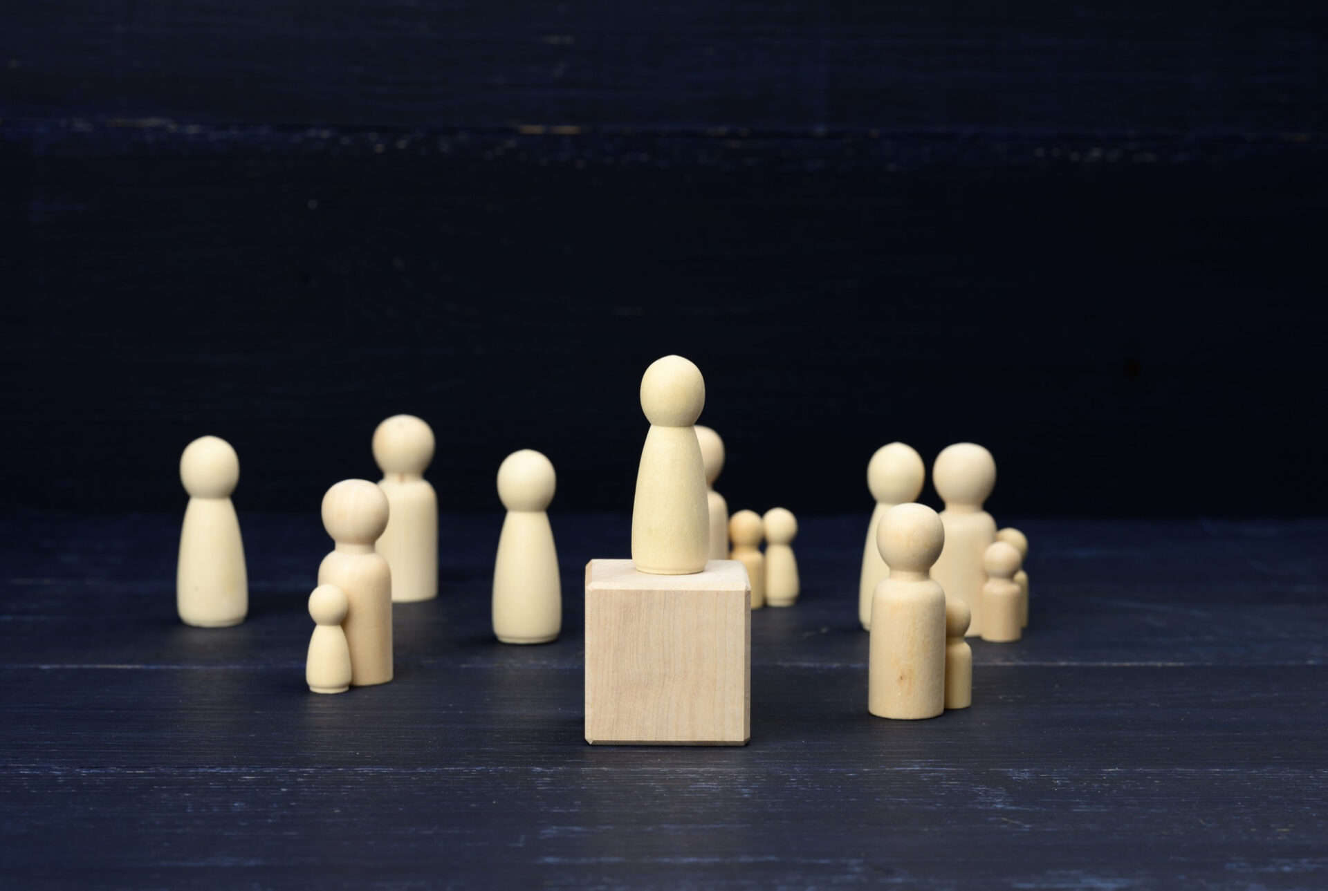 Wooden Figurines Men Blue Surface